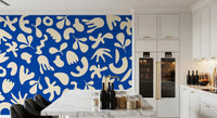 Dining area finished with Blue Organic wall mural in graphic style