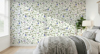 Blue Pastel Butterfly Garden Wallpaper behind a white wooden bed frame., GD7684
