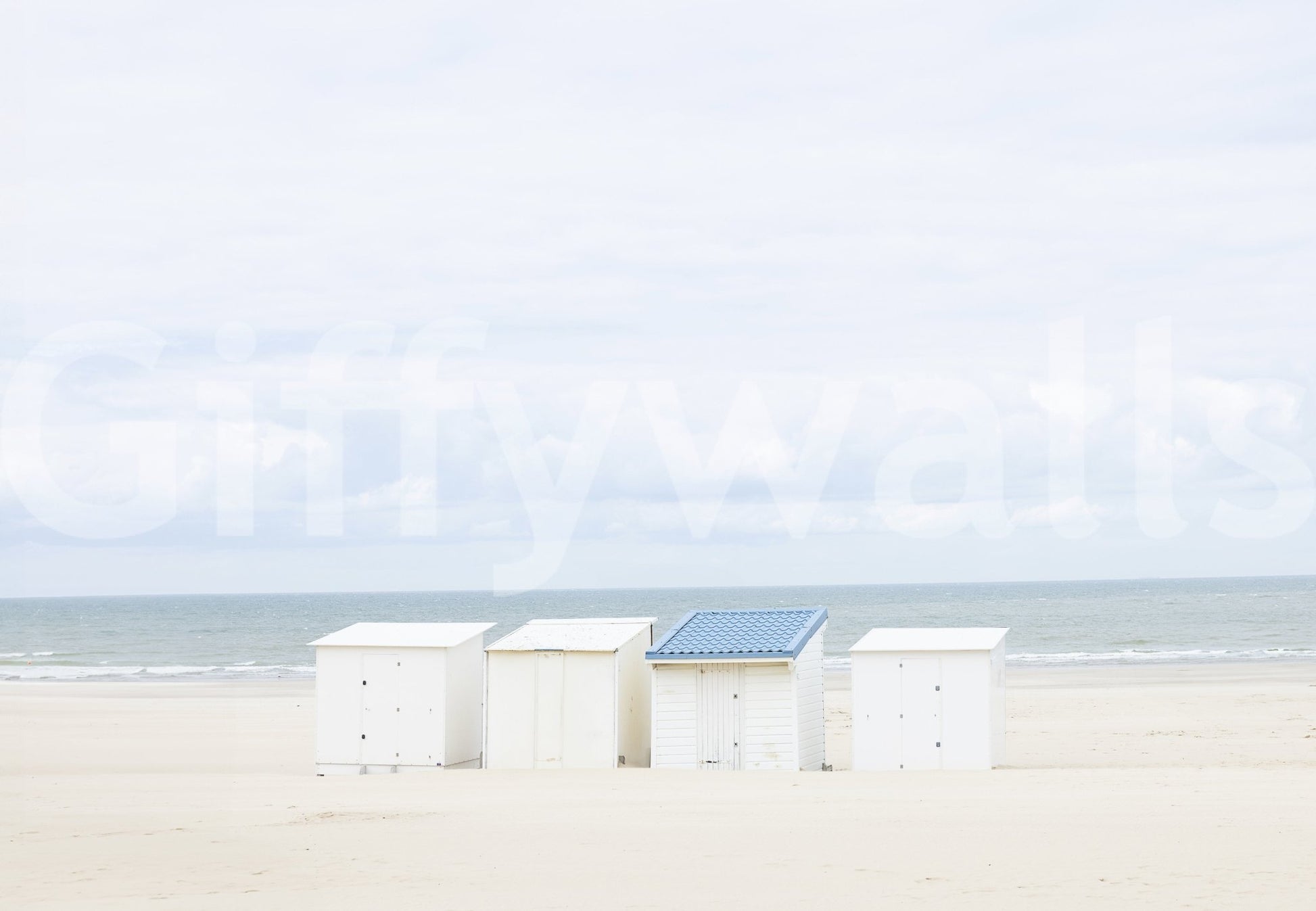 Blue roof hut on empty seashore

