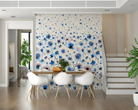Bluebell Blush Wall Mural behind a wooden desk in a home office wallpaper.