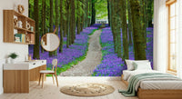 Beautiful woodland wallpaper with purple bluebell flowers field print.