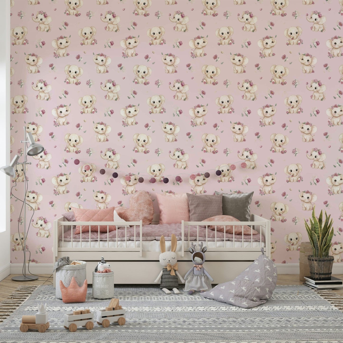 Baby elephants on soft pink background

