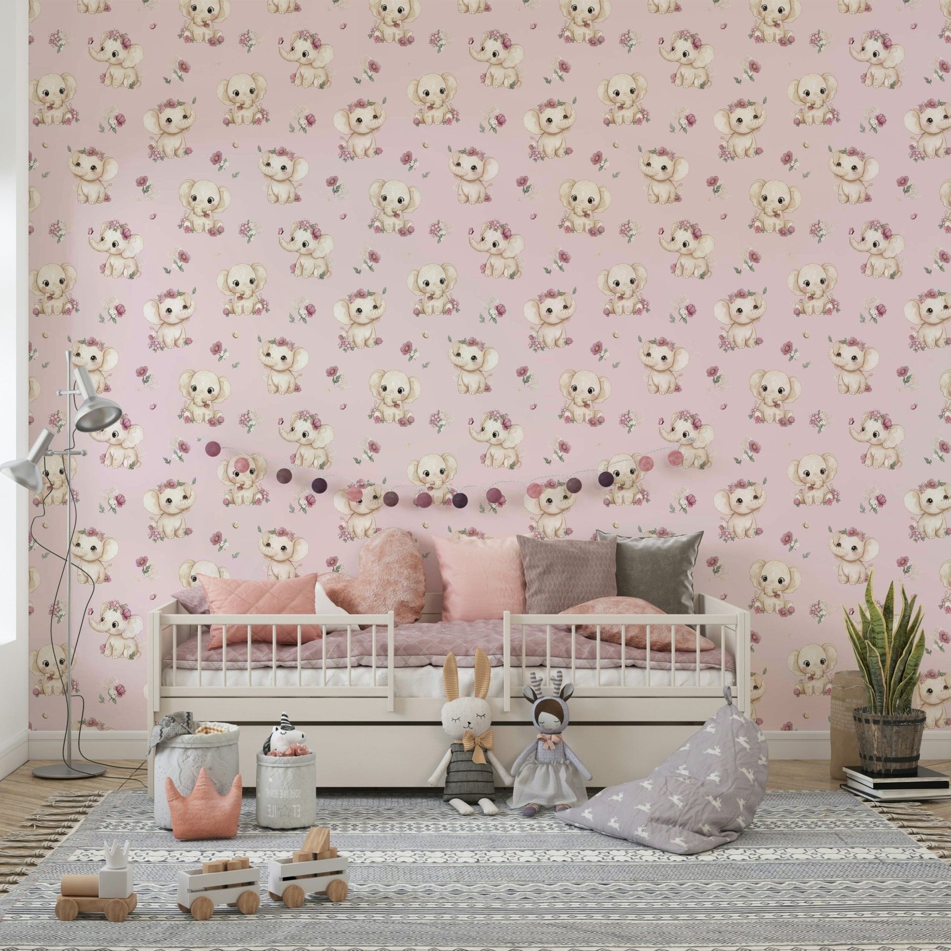 Baby elephants on soft pink background

