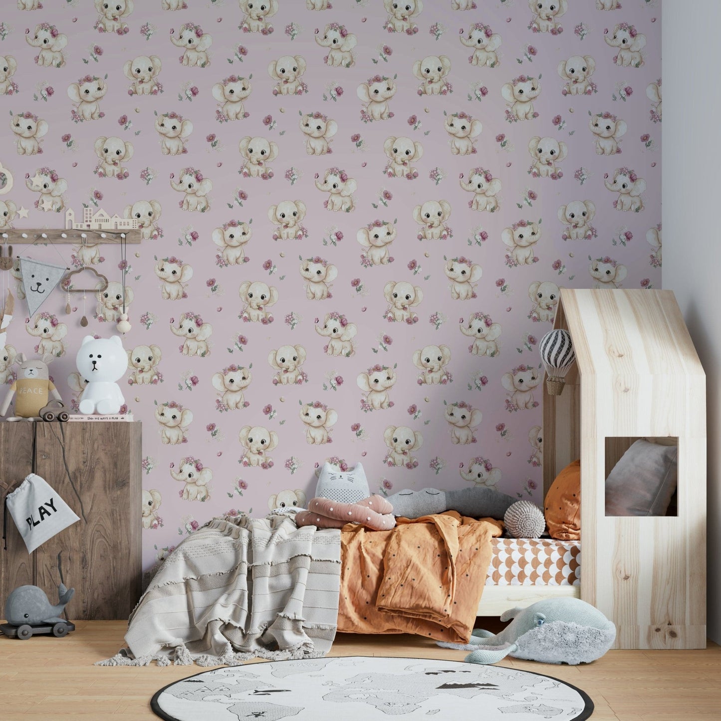 Hand-drawn elephants with pink blooms

