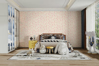 Modern blush bloom wallpaper on bedroom wall

