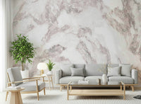 Soft pink blush stone wall mural in a nursery.