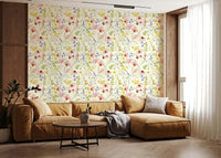 Soft blush wildflower meadow wallpaper with delicate pink floral patterns.