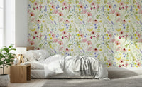 Vintage inspired wildflower meadow wall mural with soft pastel hues.