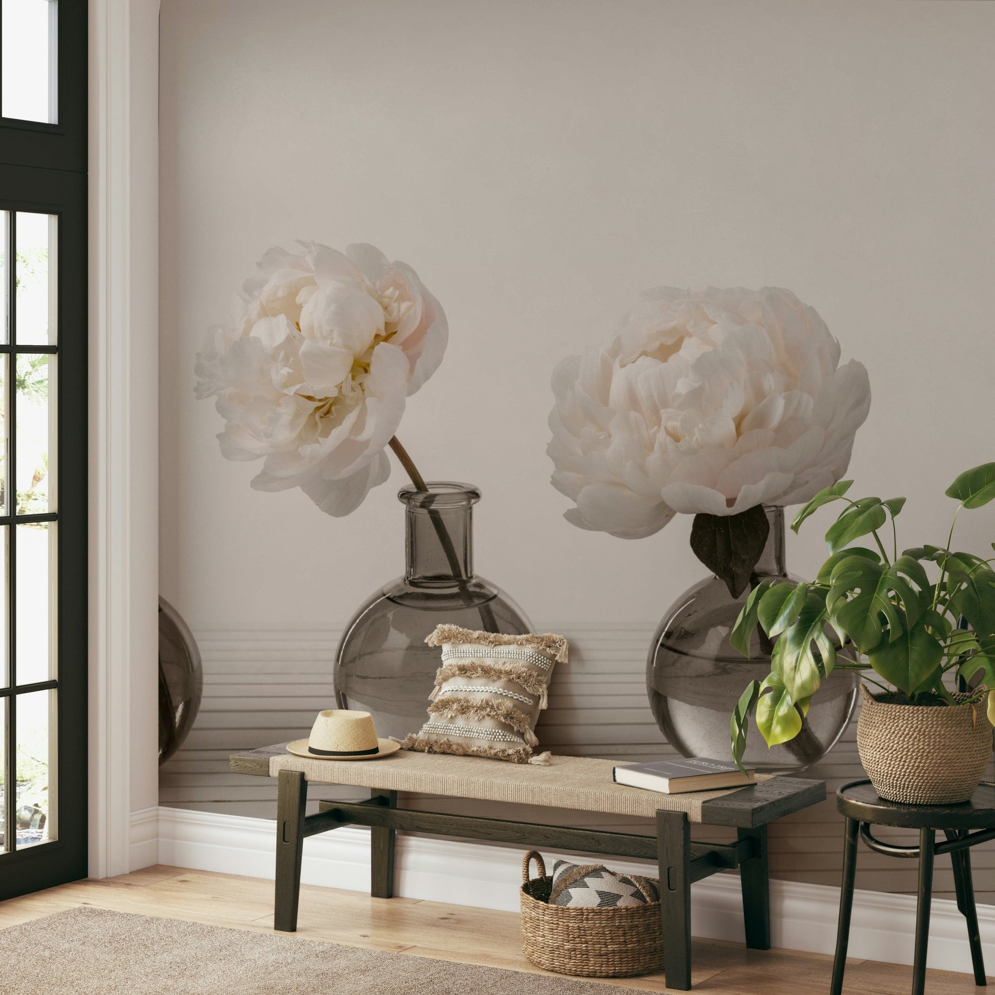 A wall mural featuring four vases with peonies.

