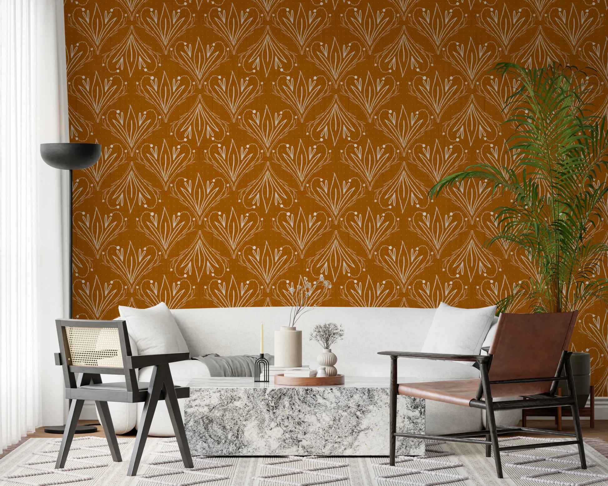 Spacious lounge with mustard gold folk floral wallpaper and natural textures