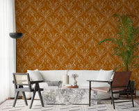 Spacious lounge with mustard gold folk floral wallpaper and natural textures