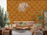 Modern living space with mustard gold patterned wallpaper and bright open layout