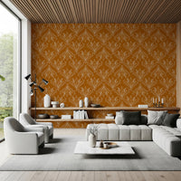 Relaxed interior styled with mustard gold patterned wallpaper and modern furniture