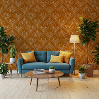 Cozy lounge interior with mustard gold botanical wallpaper and warm decor accents
