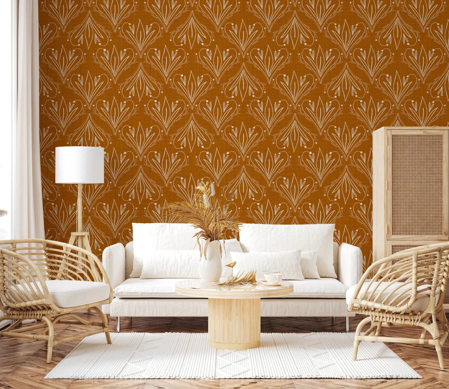 Living room setup featuring mustard gold floral wallpaper with soft neutral sofa