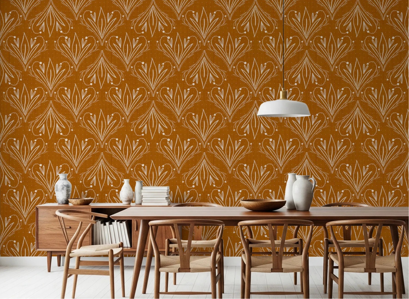 Dining room styled with mustard gold folk floral wallpaper and wooden furniture