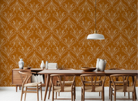 Dining room styled with mustard gold folk floral wallpaper and wooden furniture