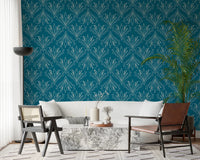 Relaxed seating zone with teal blue botanical wallpaper and neutral furniture mix, GD8316