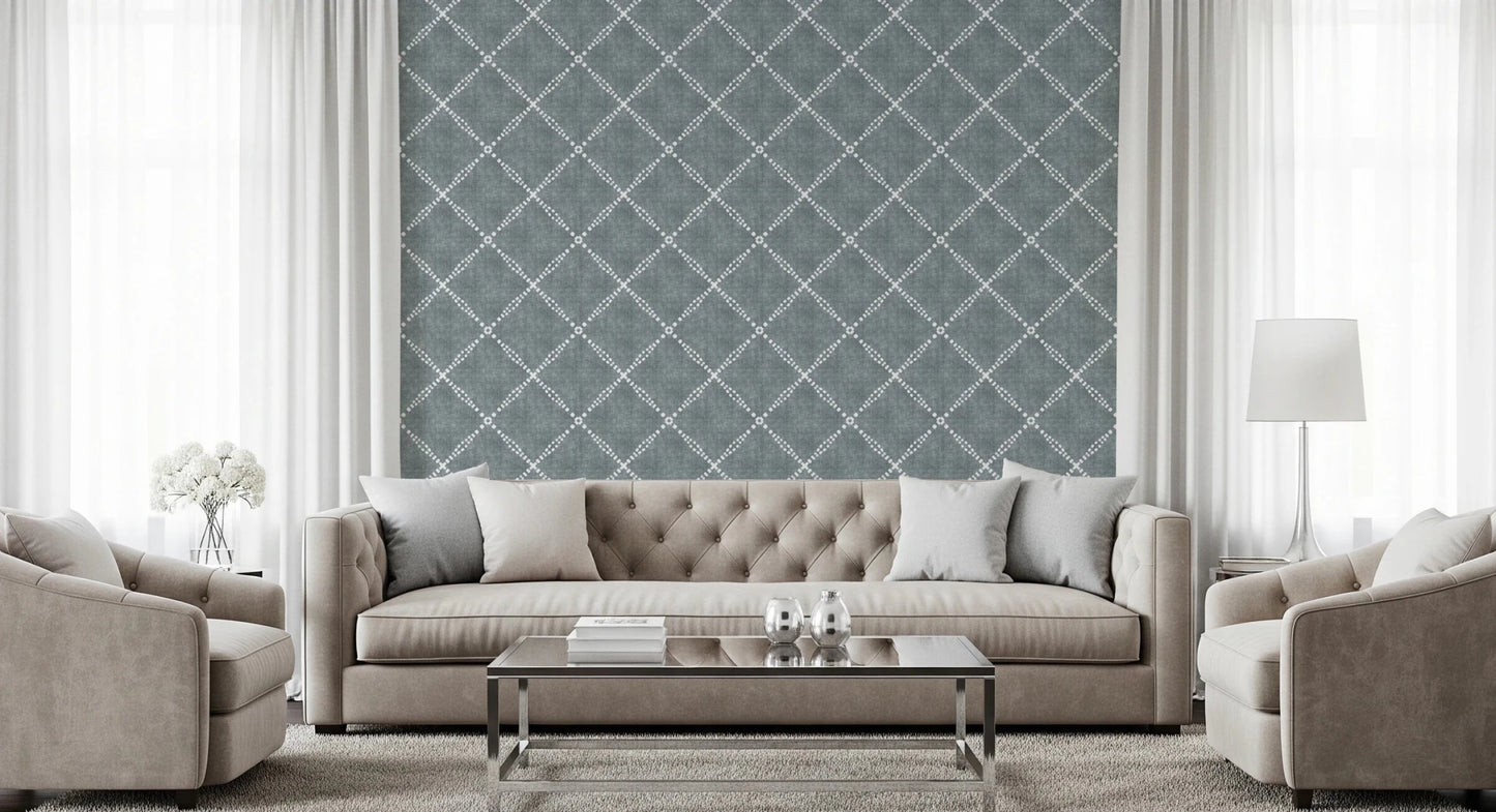 Minimal living room framed with calming blue trellis wallpaper and airy arrangement