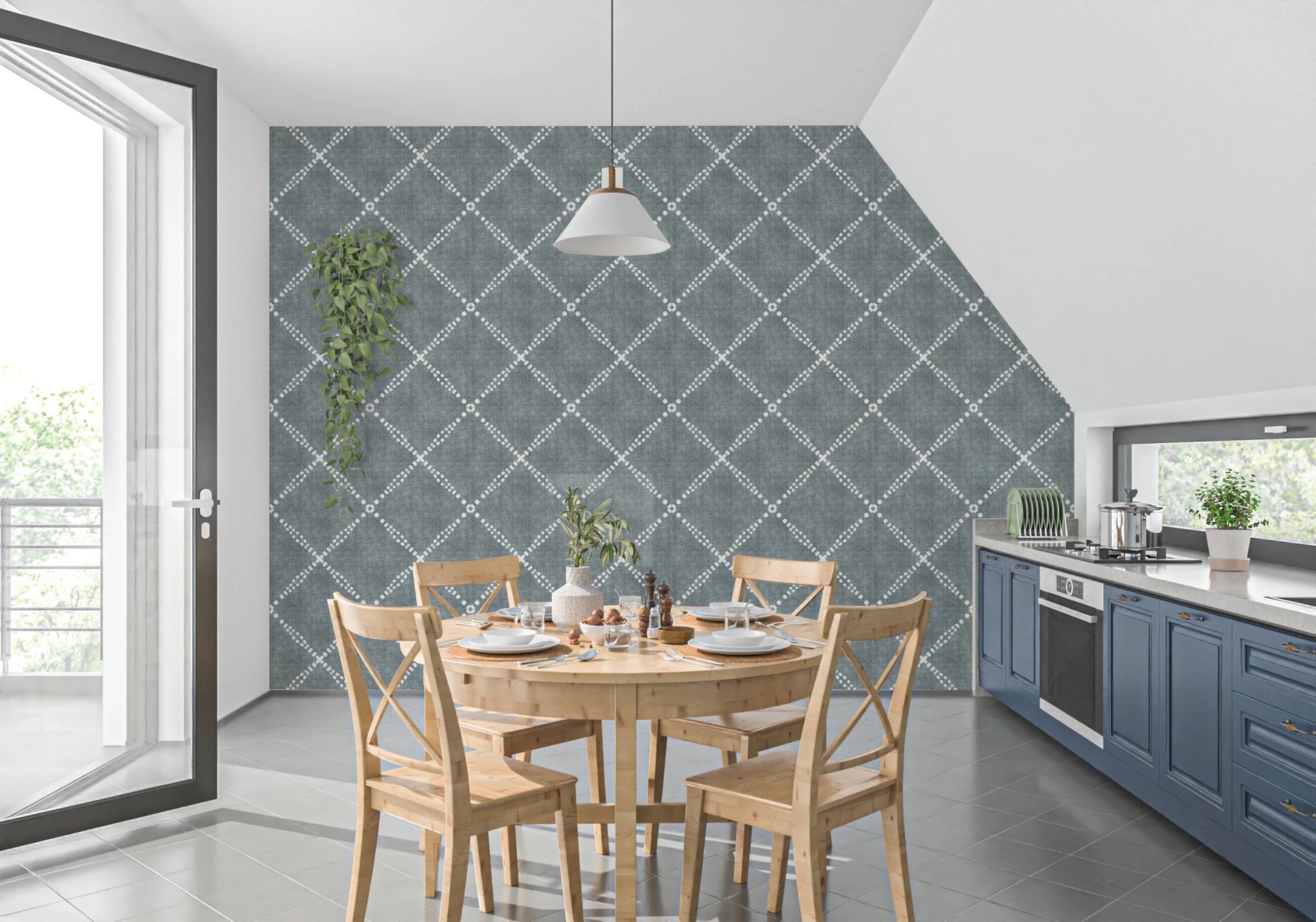 Kitchen dining zone finished in calming blue dotted trellis wallpaper with light accents
