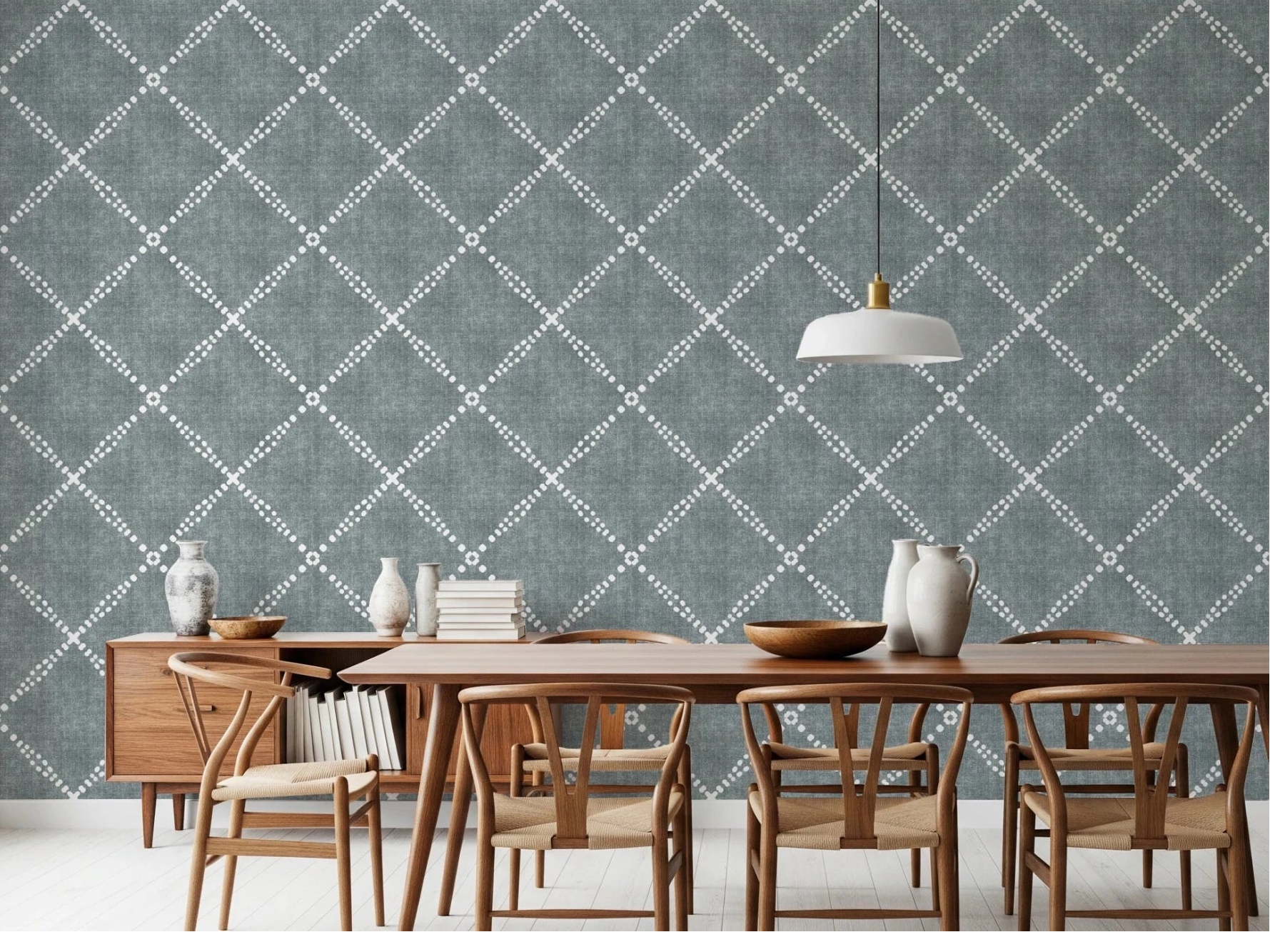 Dining room styled with calming blue dotted trellis wallpaper and wooden table setting