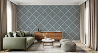 Open living area enhanced by calming blue dotted trellis wallpaper and gentle texture