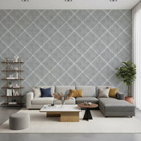 Contemporary living area enhanced by grey dotted trellis wallpaper and calm tones