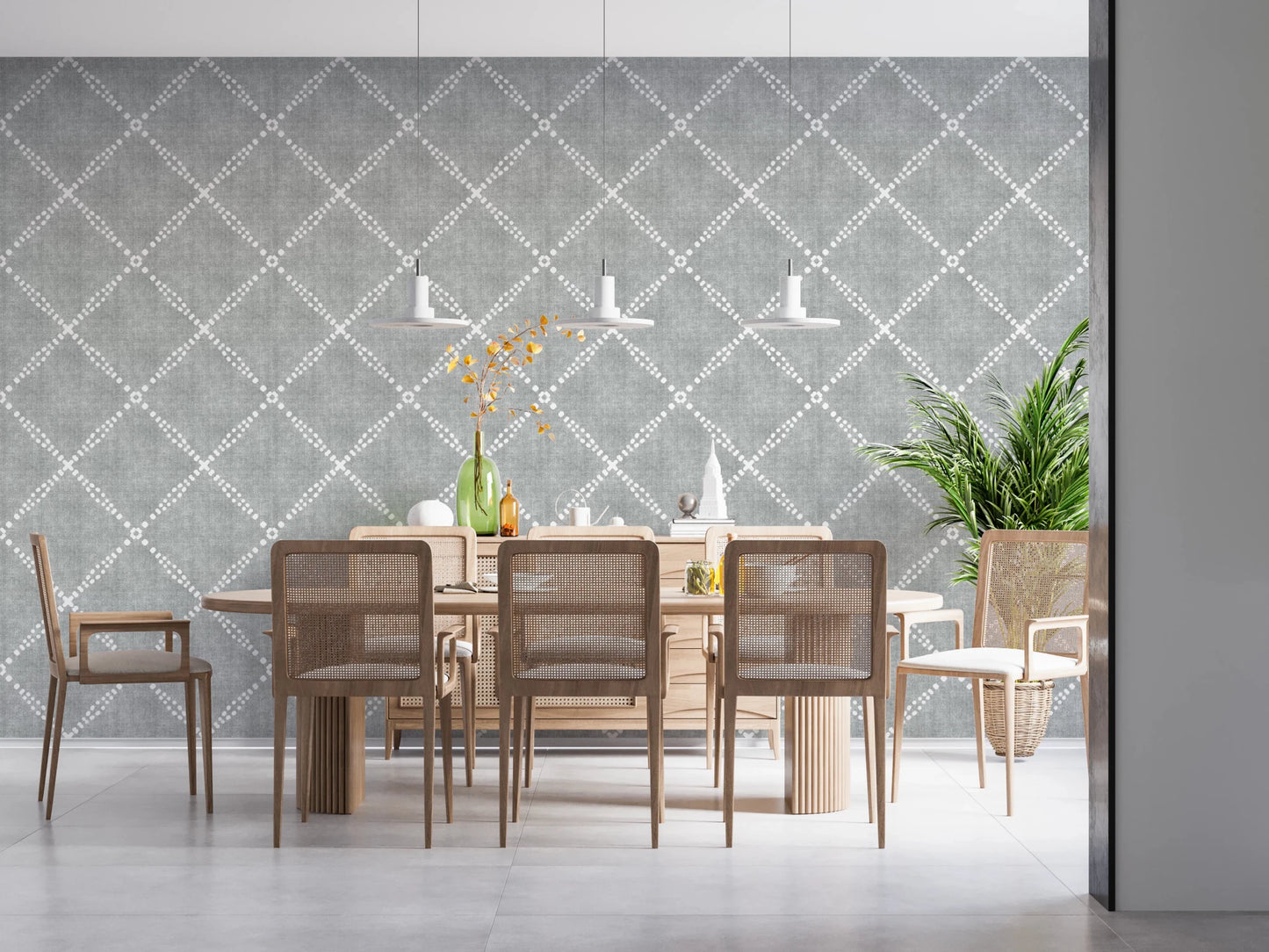 Dining room space finished in grey dotted trellis wallpaper with simple table setting