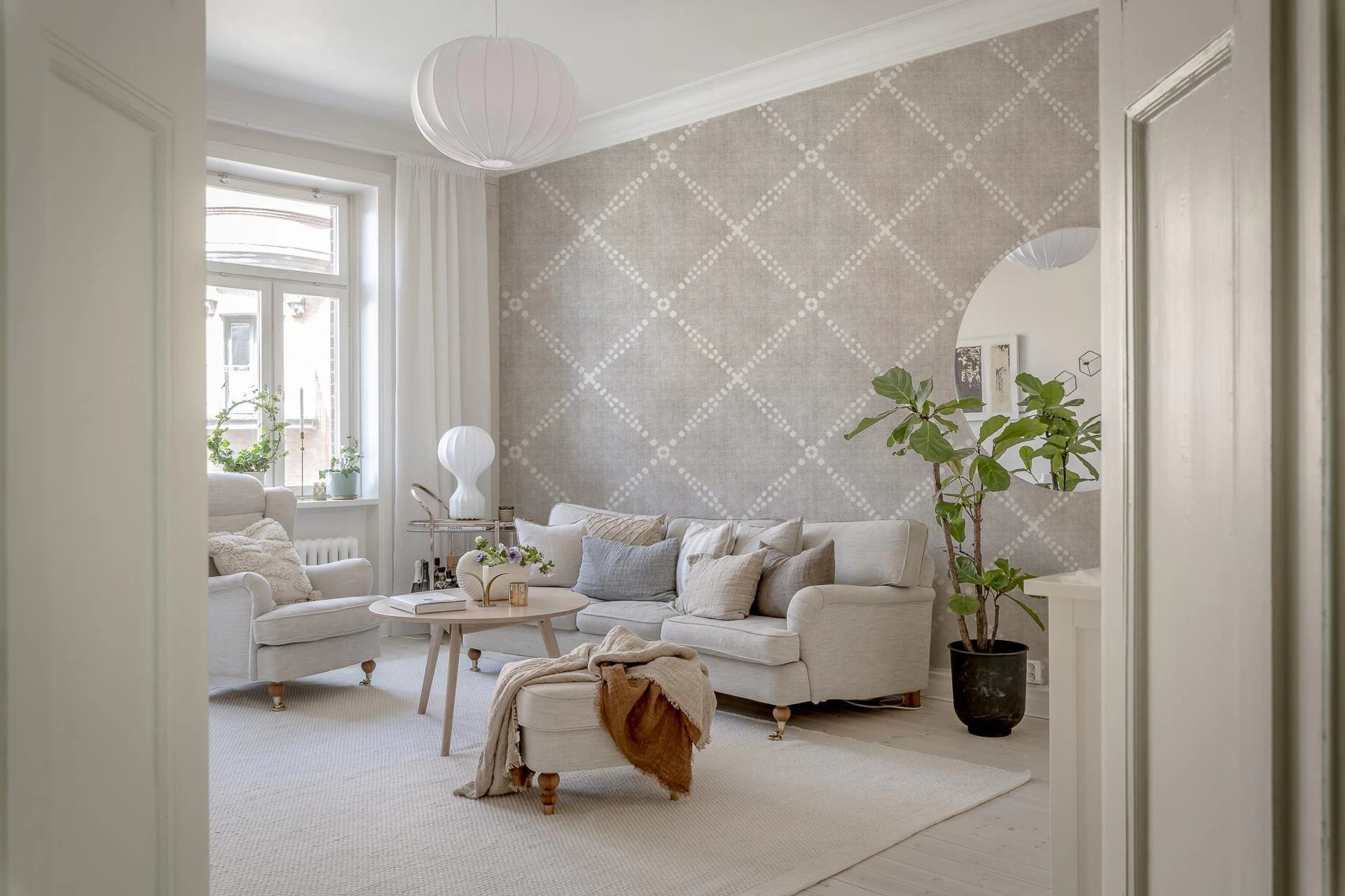 Bright sitting area paired with Boho Dotted Trellis Grunge Neutral Wallpaper, GD8575