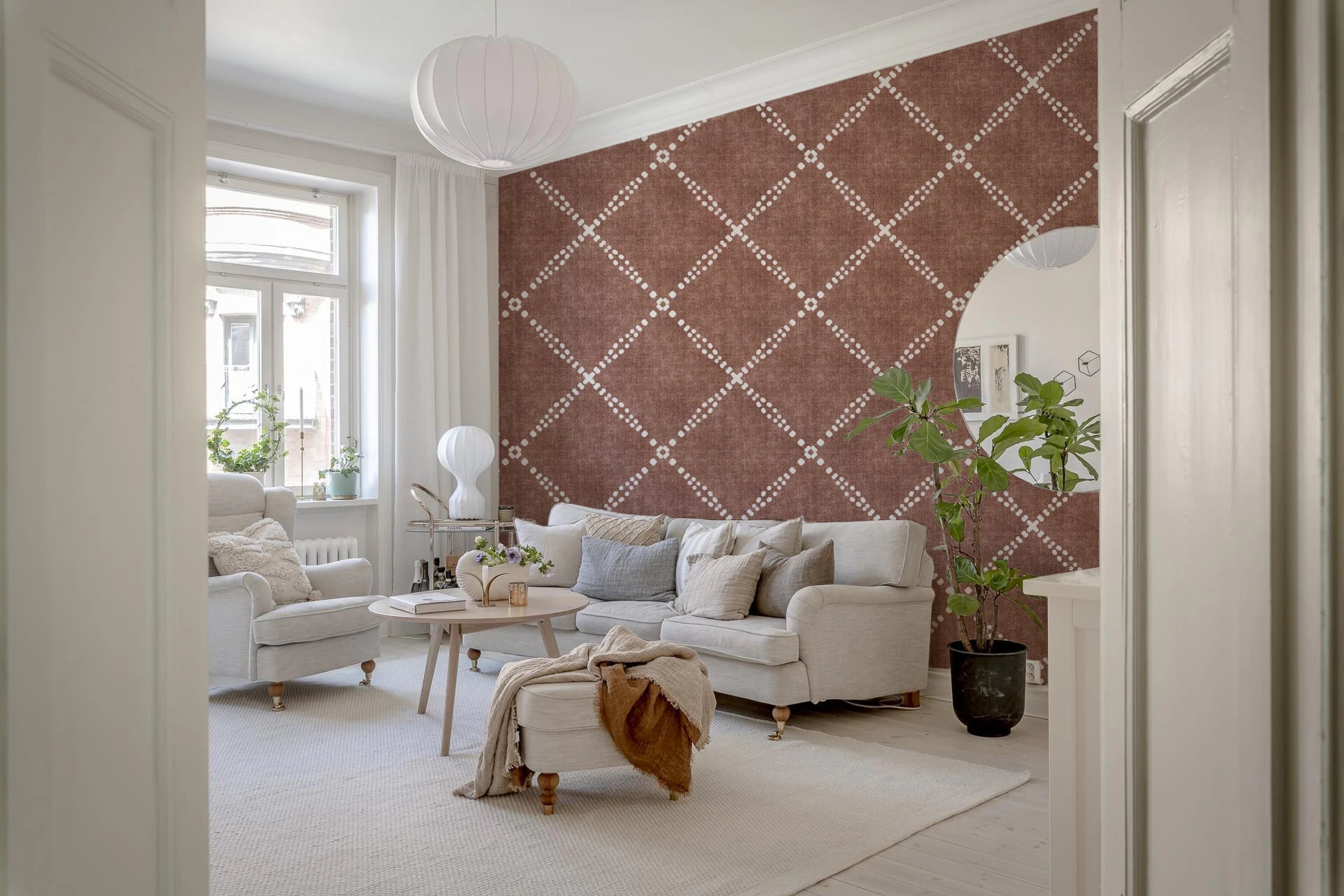 Soft lounge corner framed by Boho Dotted Trellis Grunge Terracotta Red Wallpaper