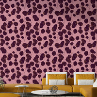 A bohemian plum leaf mural on decorative wallpaper.

