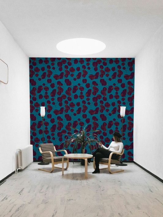A beautiful boho floral wallpaper mural with teal accents.

