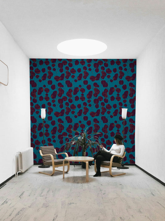 A beautiful boho floral wallpaper mural with teal accents.

