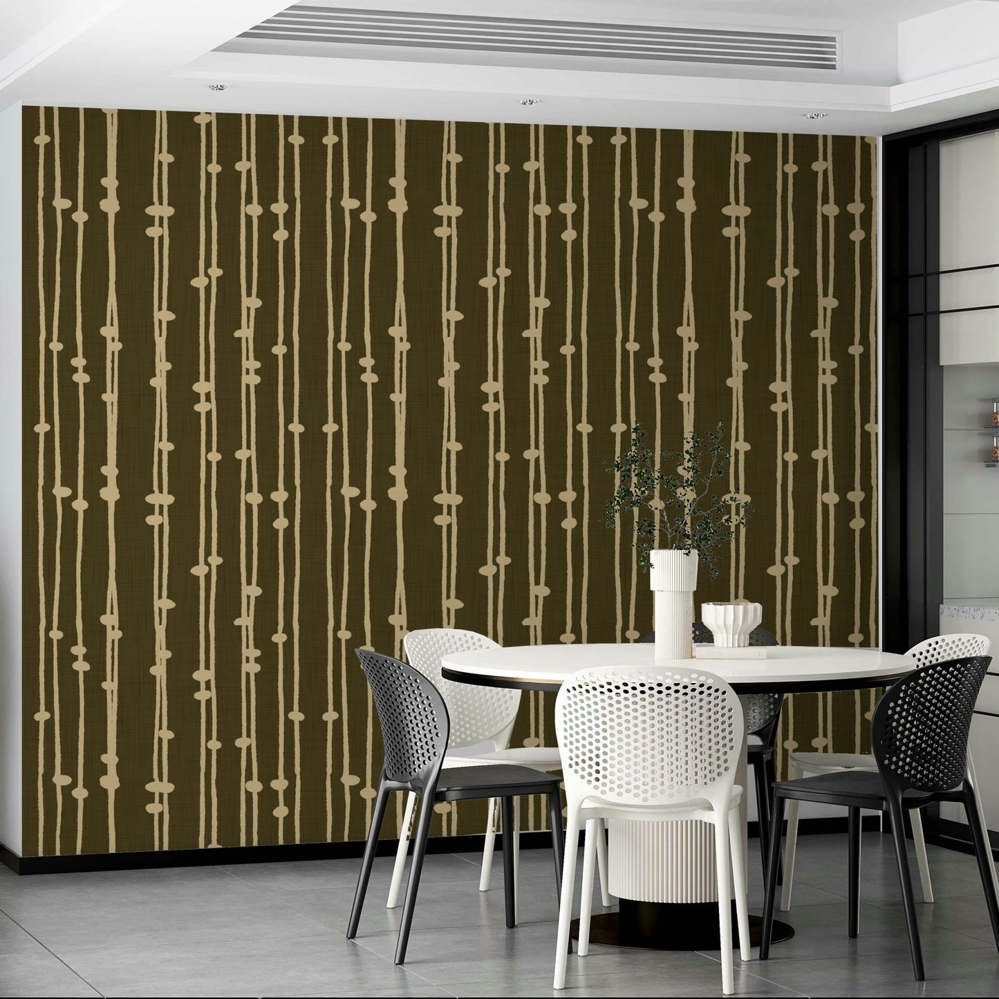 The wallpaper is used to create a feature wall in a dining room.

