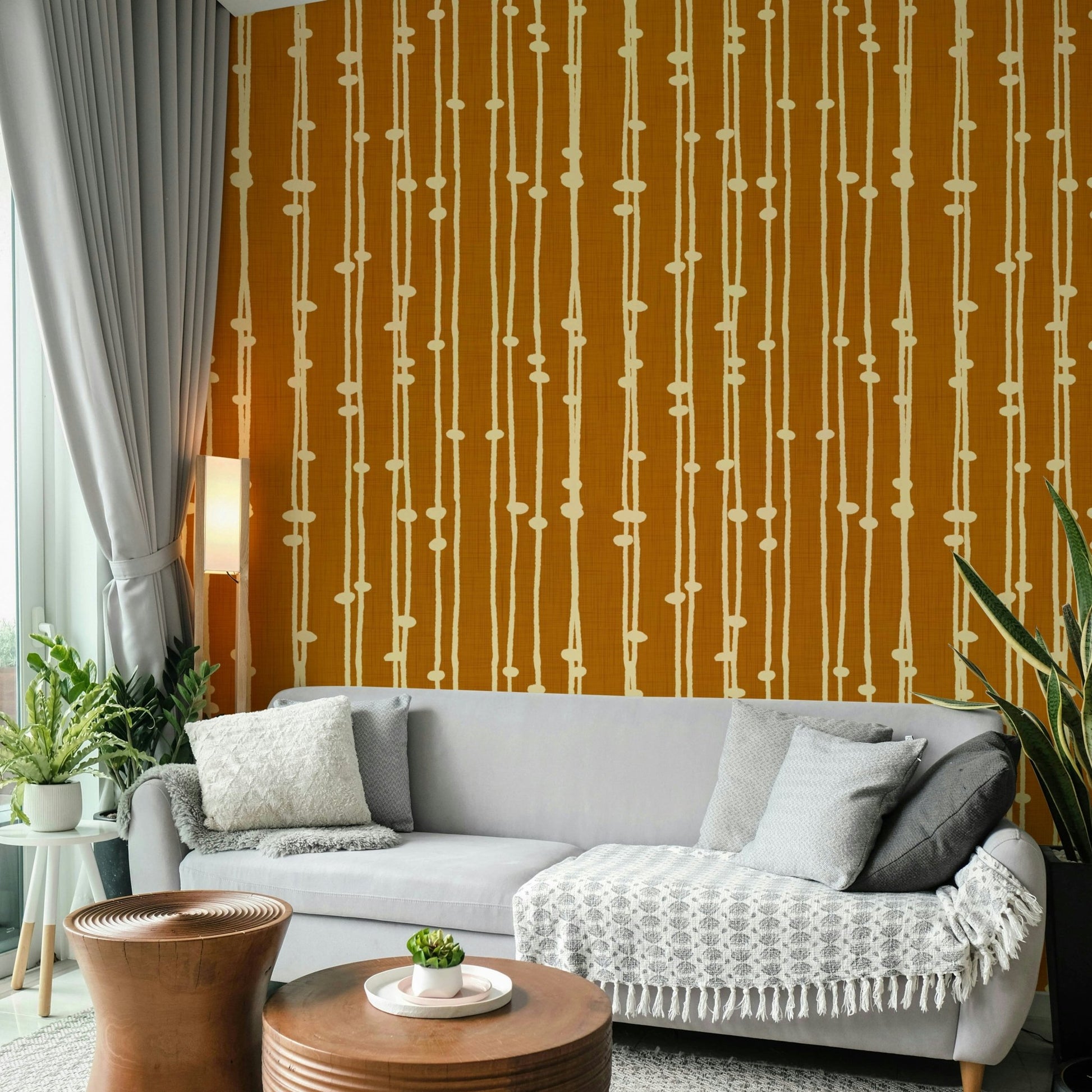 A minimalist home office with the boho striped wallpaper.
