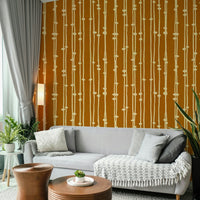 A minimalist home office with the boho striped wallpaper.