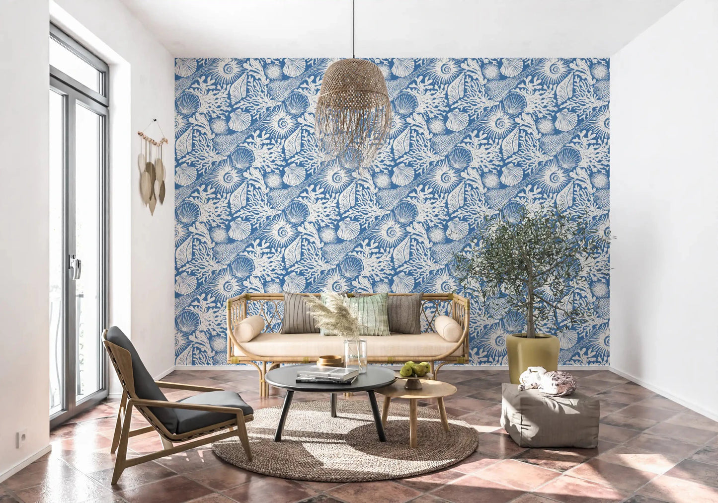 Shells and corals scatter behind a hallway in Boho Denim Blue wallpaper.⁠GD9548