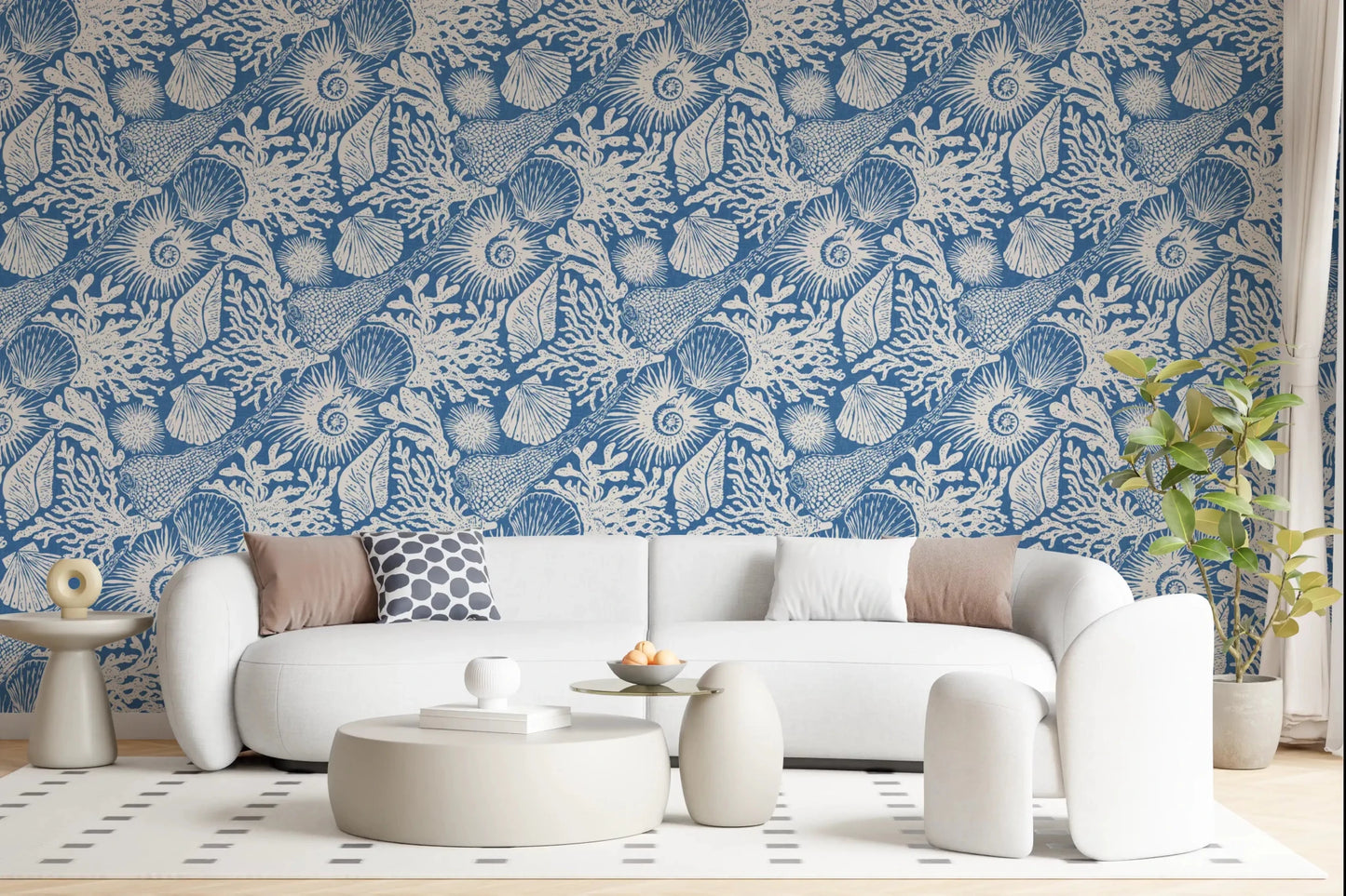 Vintage sea drawings fill a sitting room with Boho Seashell Denim wallpaper.
⁠GD9548