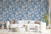 Vintage sea drawings fill a sitting room with Boho Seashell Denim wallpaper.
⁠GD9548