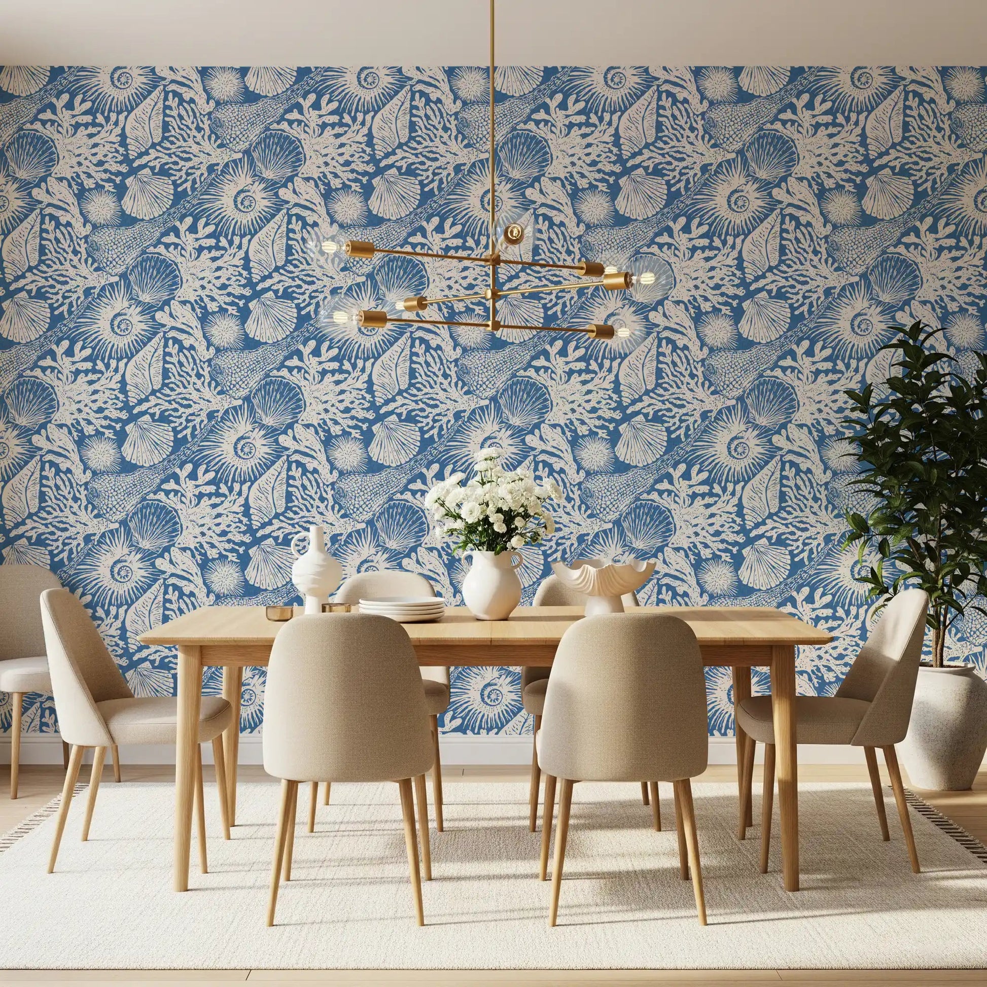 White hand-drawn motifs sit on the deep denim base of Seashell Coral wallpaper.⁠GD9548