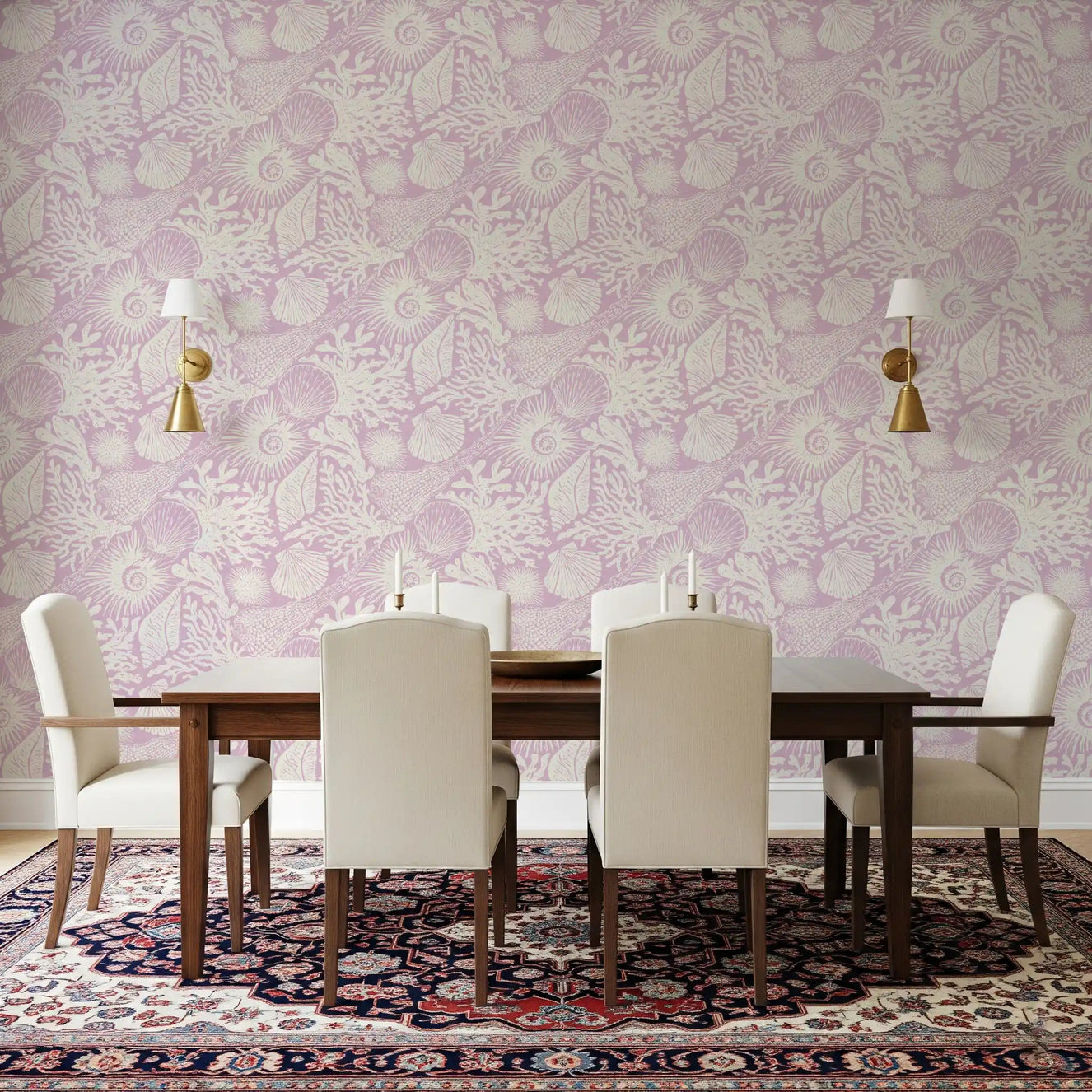 Cream marine sketches sit behind a dining room with Boho Seashell Coral wallpaper.GD9546