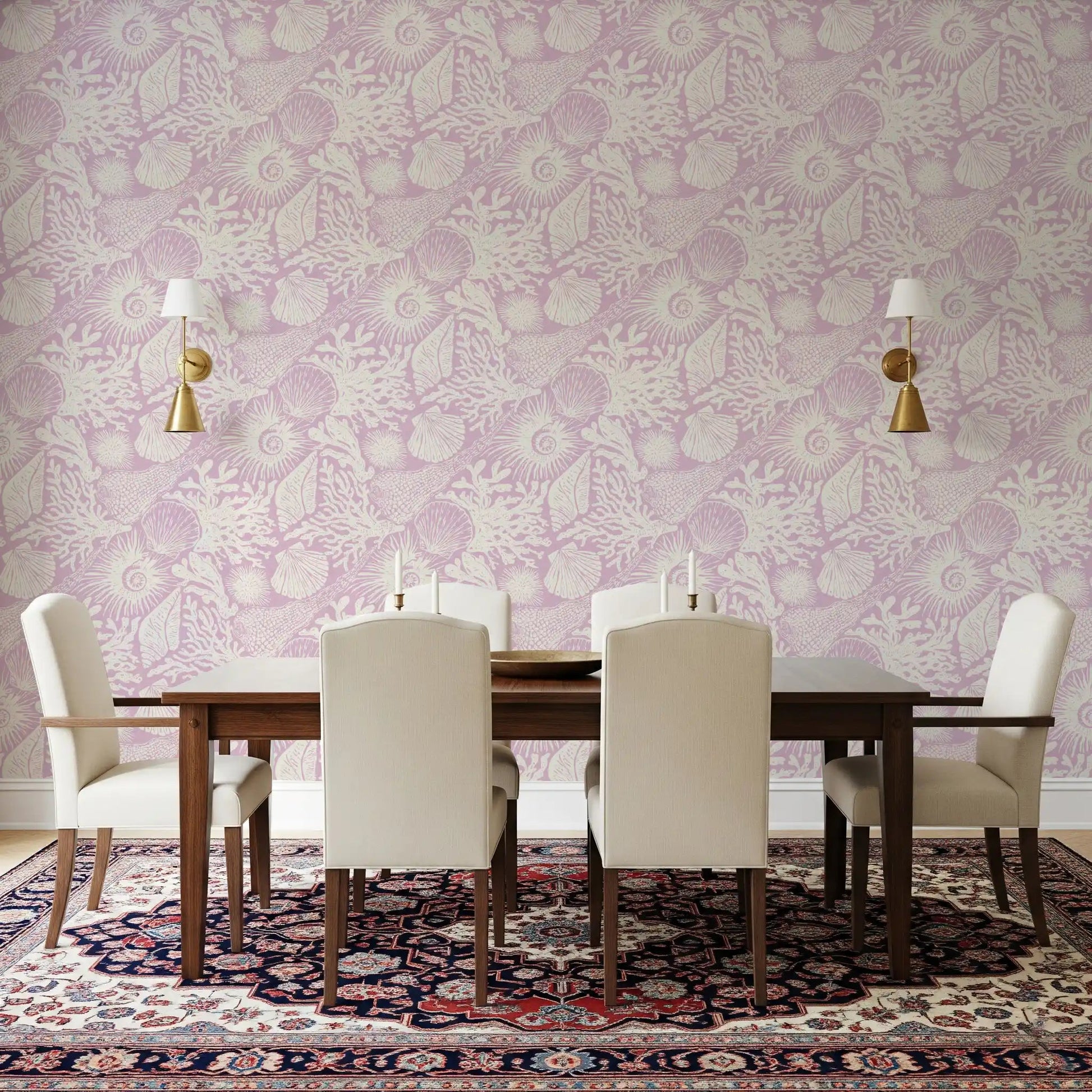 Cream marine sketches sit behind a dining room with Boho Seashell Coral wallpaper.GD9546
