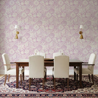 Cream marine sketches sit behind a dining room with Boho Seashell Coral wallpaper.GD9546