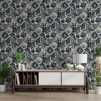 Coral, kelp, and shells sit packed yet balanced across Boho Midnight Blue wallpaper.GD9544