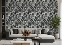 Bold ink shells wrap a living room behind Boho Seashell Coral wallpaper in midnight blue.⁠GD9544