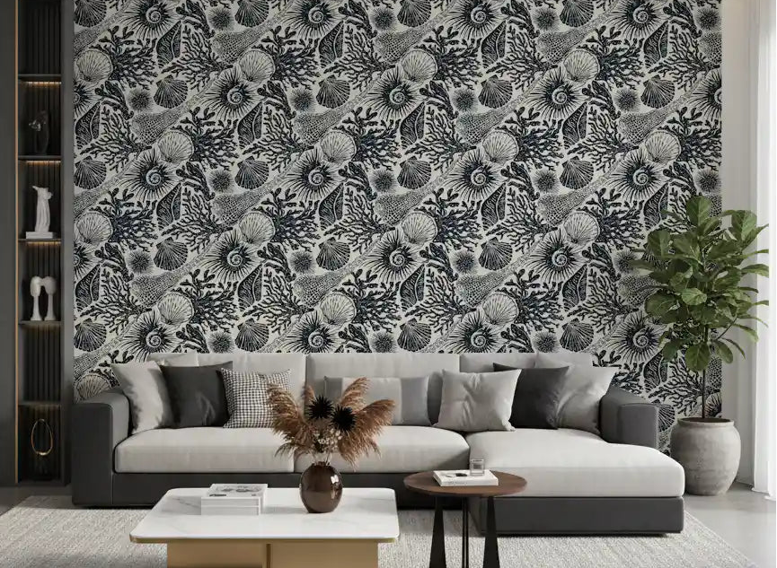 Bold ink shells wrap a living room behind Boho Seashell Coral wallpaper in midnight blue.⁠GD9544