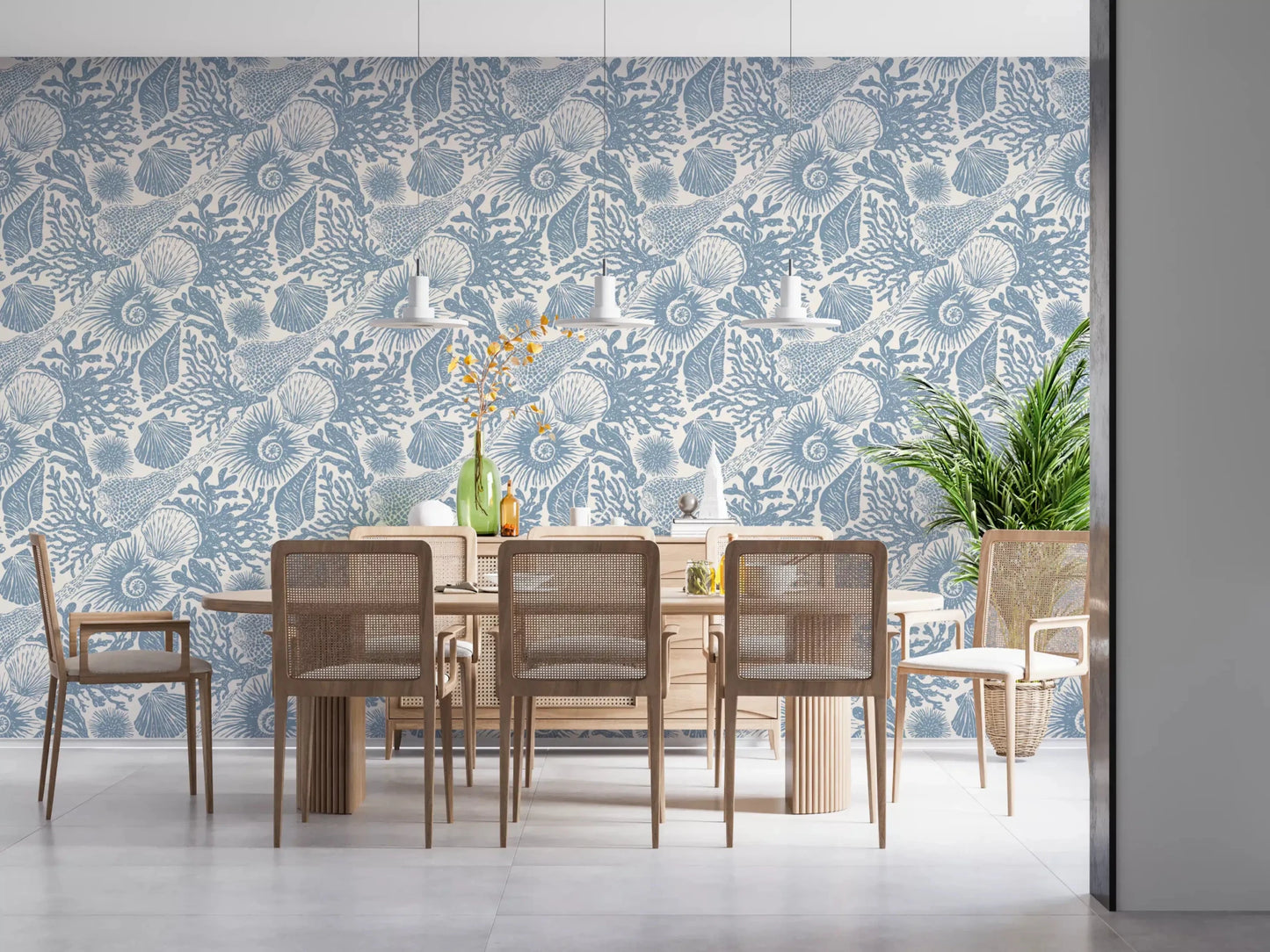 Across the Dining room, calm blue flows through Seashell Coral Muted Blue wallpaper.r⁠GD9545
