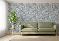 Shells and corals settle behind a Living room in Boho Off-White Azure wallpaper.⁠GD9547