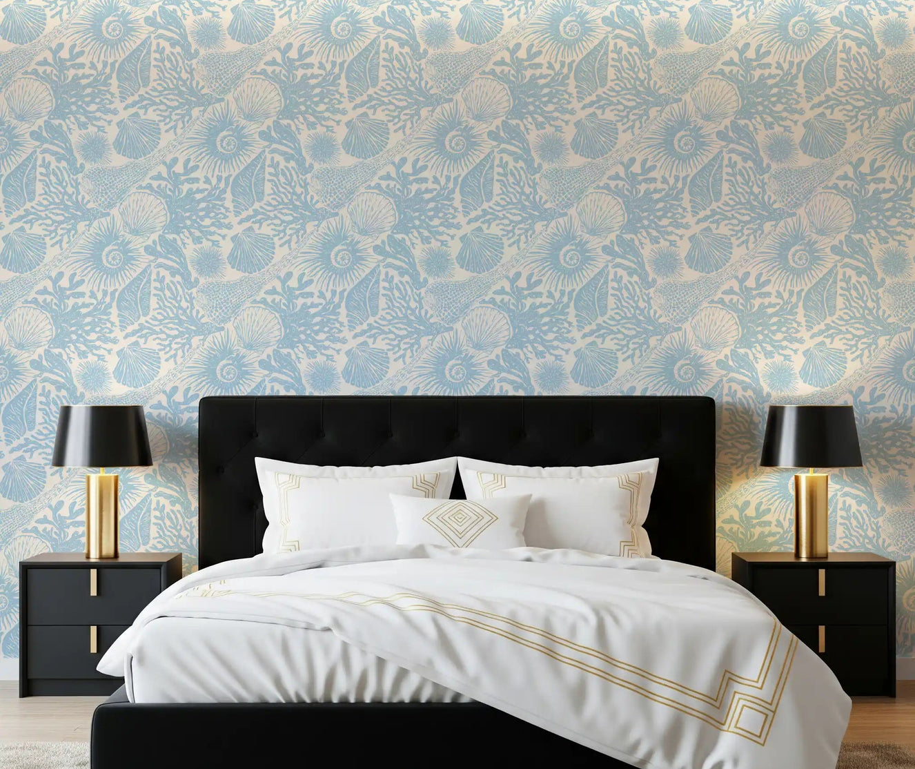 Pale blue shells wrap a bedroom behind Boho Seashell Coral wallpaper in soft tones.GD9543