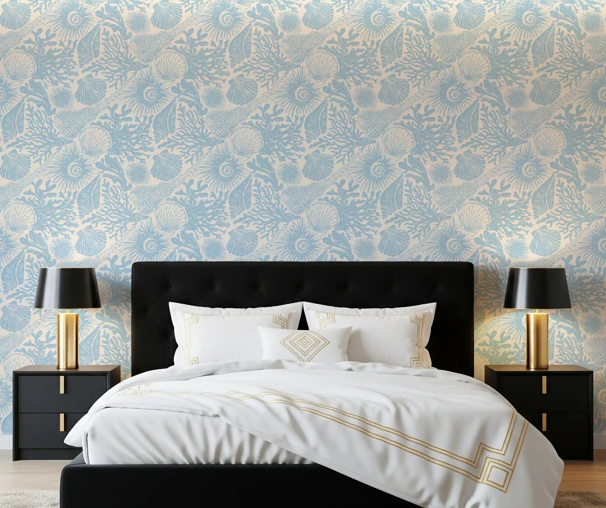Pale blue shells wrap a bedroom behind Boho Seashell Coral wallpaper in soft tones.GD9543
